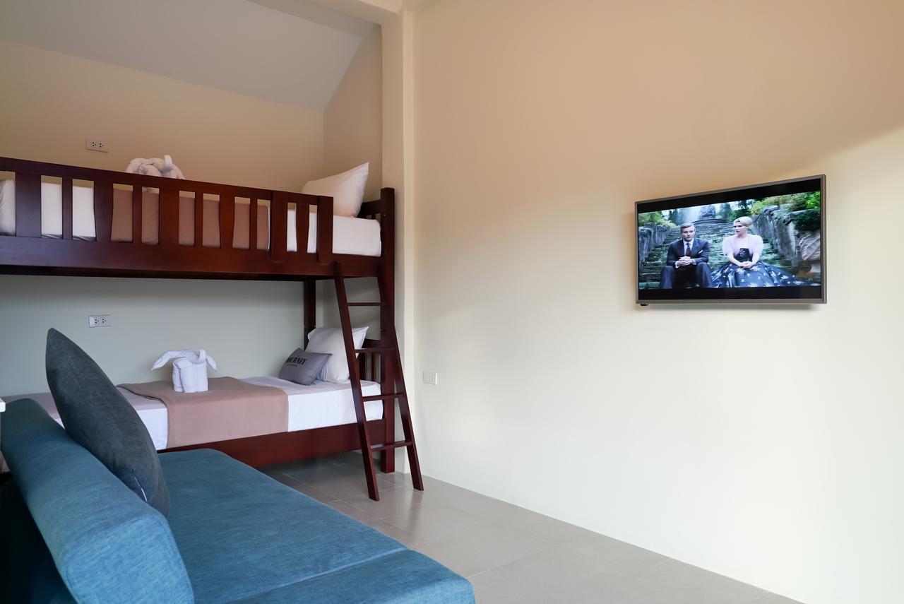 Eriksson Guesthouse Patong Rum bild